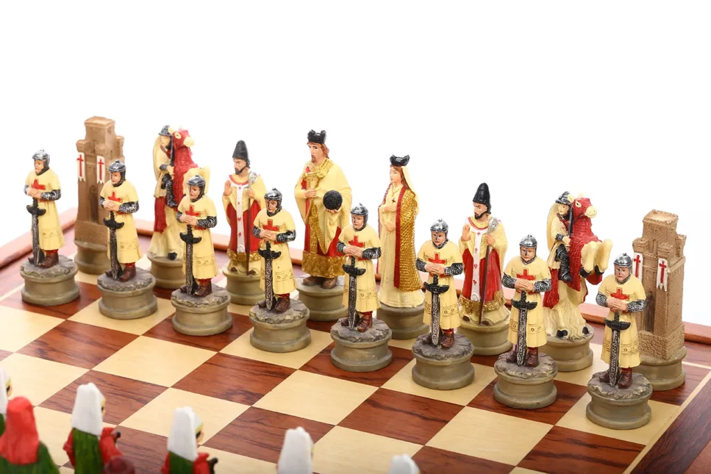 Crusader Kingdom chessmen close-up highlighting sculpted costume details