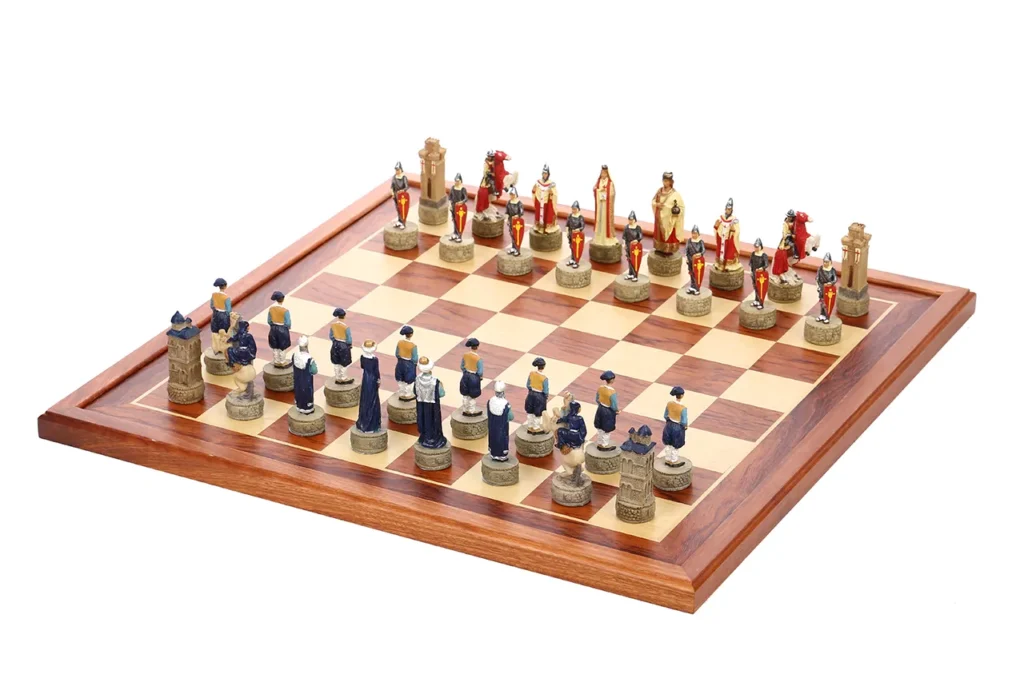 Crusader royal court chessmen arranged in front with Ottoman nobility pieces opposite